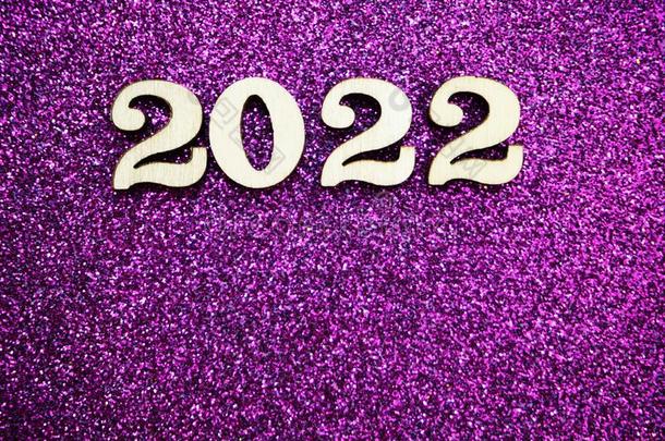 幸福的新的年<strong>2022</strong>和空间复制品向紫色的闪烁背景