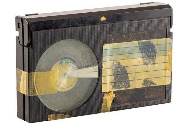 Beta制大尺寸磁带录像系统磁带录像盒式录音带带子,隔离的向白色的背景.老的英语字母表的第12个字母