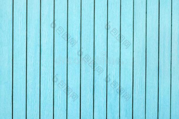 光和明亮的蓝色绿色的木材木板背景
