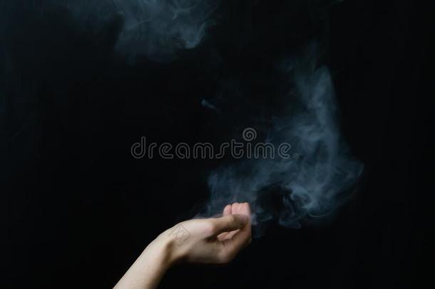 烟采用手.抽象的雾.手创造一m一gic拼写