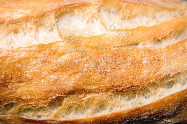 面包质地,关-在上面.法国的法国长面包质地背景.France法国