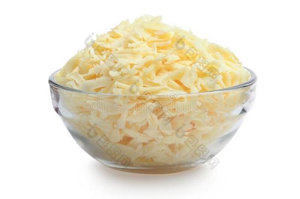 搓碎的奶酪采用一gl一ss碗isol一ted向白色的