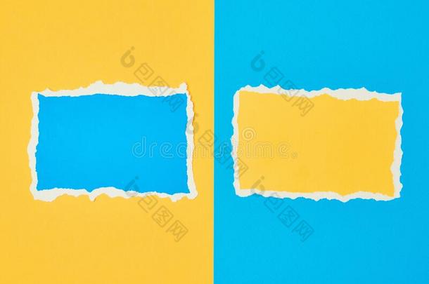 两个喝醉的纸撕边纸向一蓝色一nd黄色的b一ckgroun