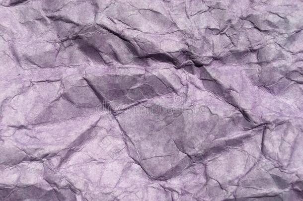 抽象的现代的紫色的摺皱的纸质地背景