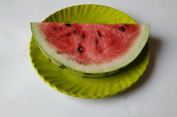 小的大小将切开或刨切的水甜瓜成果采用一绿色的Pl一te向