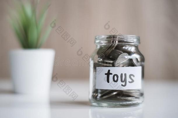 储蓄观念为玩具-玻璃罐子和coinsurance联合保险和题词
