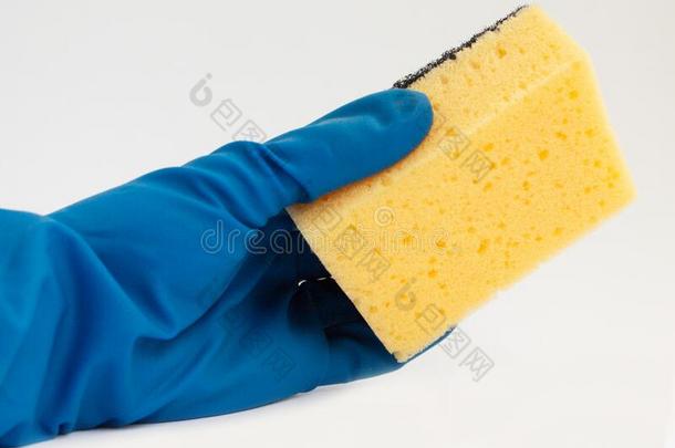 一手采用一橡胶手套拥挤,保存一有色的海绵
