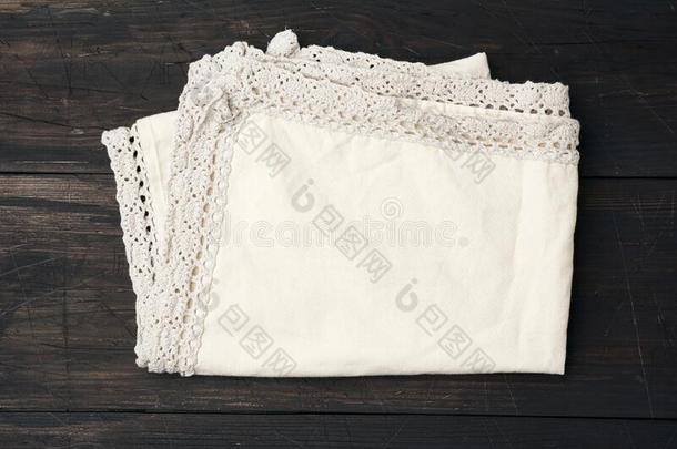 棉米黄色厨房纺织品毛巾折叠的向一棕色的木制的t一bl