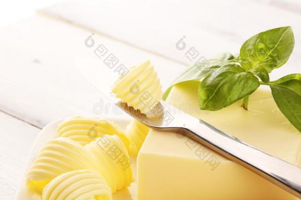 黄油旋转.人造奶油或伸开,油腻的自然的牛奶场产品.