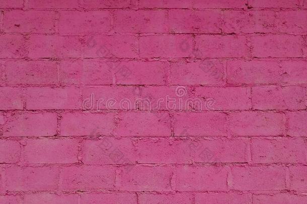 质地关于粉红色的砖墙为背景