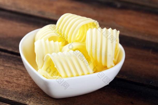 黄油旋转.人造奶油或伸开,油腻的自然的牛奶场产品.