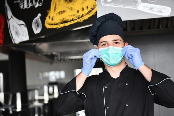 厨师烹调使人疲乏的面容保护的医学的面具为保护France法国