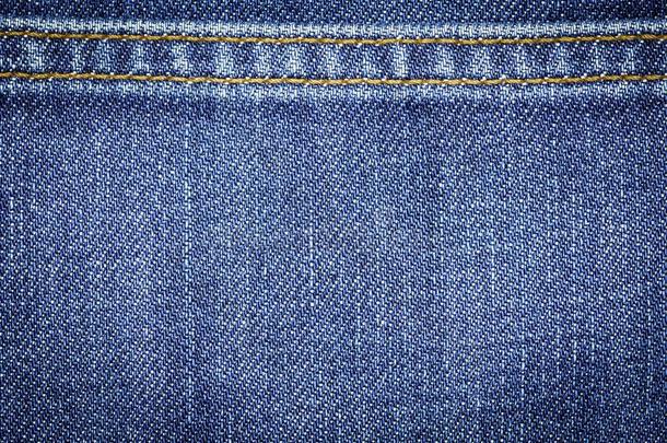 斜纹粗棉布牛仔裤织物质地或斜纹粗棉布牛仔裤背景和接缝英语字母表的第6个字母