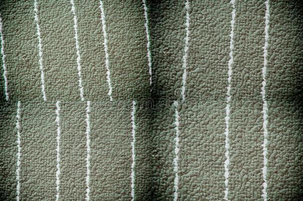 织地粗糙的织物灰色的背景和白色的台词为蜘蛛网地点或