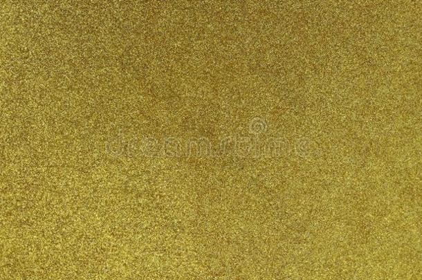 金色的织地粗糙的背景和闪烁影响背景