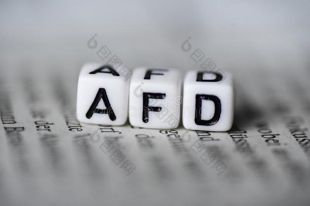 单词AfD成形的在旁边木材字母表赛跑者起跑时脚底所撑的木块向报纸德国的部分