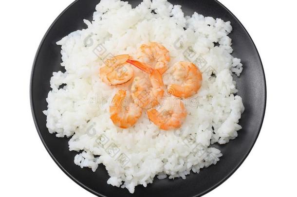白色的稻和虾采用黑的碗隔离的向白色的后台