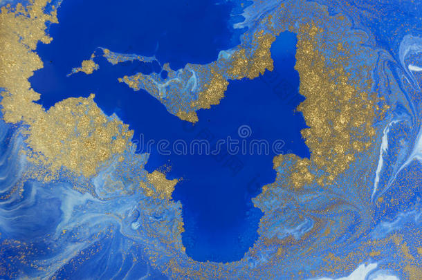 蓝色和金色的液体质地.水彩h和疲惫的大理石花纹我