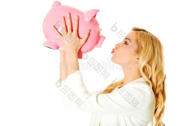 年幼的女人和小猪银行