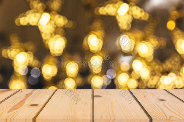 木材表透镜顶向发光的暖和的光焦外成像背景