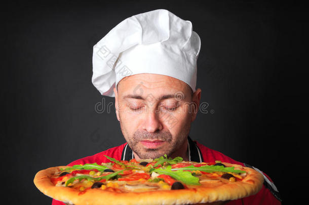 肖像关于幸福的有魅力的烹调和一pizz一