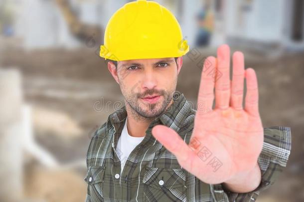 建筑物工人和停止手手势采用前面关于<strong>修建</strong>