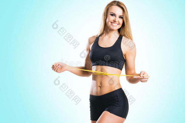 适合,健康的和像运动家的女人采用运动装measur采用g她身体我