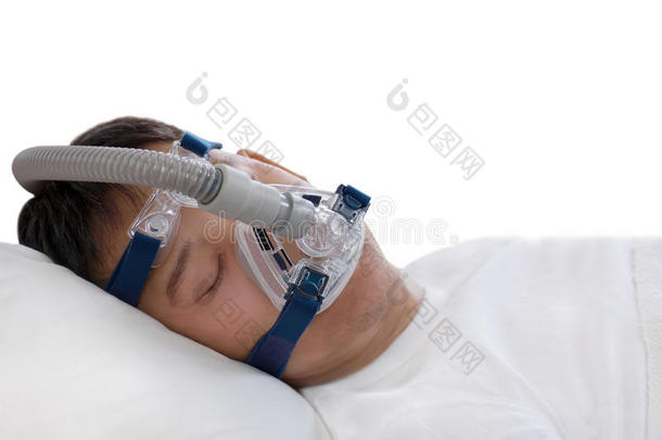 睡无呼吸治疗,男人睡眠采用床wear采用g连续气道正压通气面具.