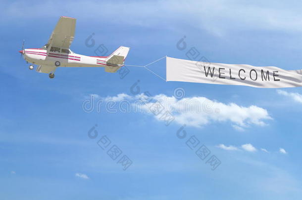 小的螺旋桨飞机拖横幅和欢迎<strong>标题</strong>采用英语字母表的第20个字母