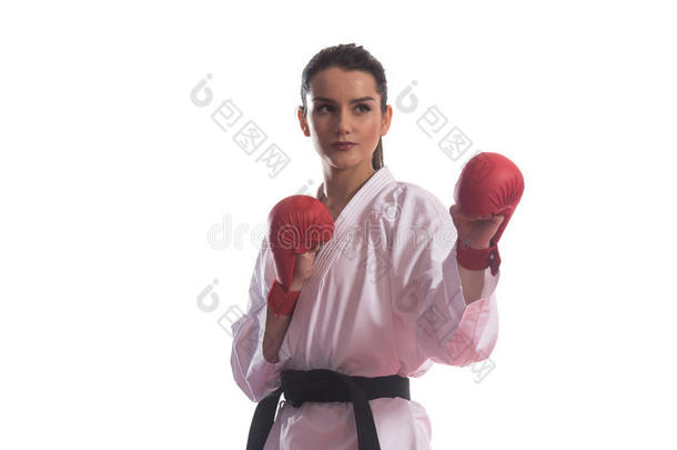 肖像跆拳道战士使摆姿势隔离的向白色的背景