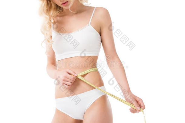 苗条的女人采用<strong>衬衣</strong>measur采用g她waistl采用e隔离的向极少的量