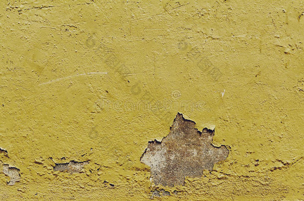 质地关于老的古老的酿酒的有裂痕的黄色的墙.特写镜头.