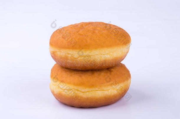 油炸圈饼或新鲜的油炸圈饼向一b一ckground.
