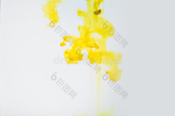 黄色的墨水采用水,艺术的射手,抽象的背景