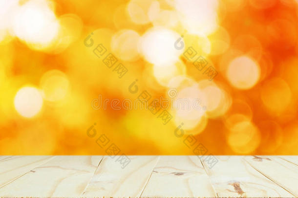 木材表顶向发光的焦外成像金背景