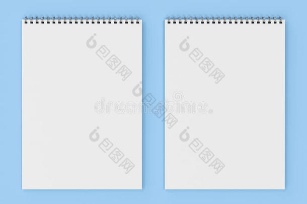 空白的白色的笔记簿和金属螺旋跳向蓝色背景