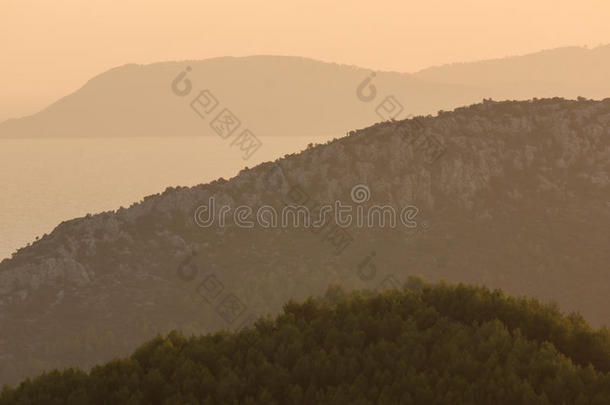 令人惊异的日落风景关于锡索尼亚半岛,哈尔基季基半岛,同意