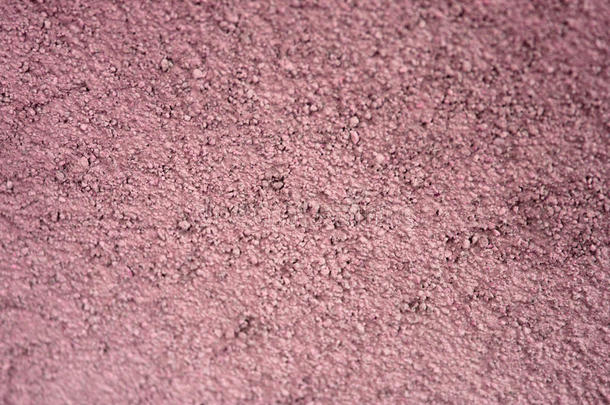 淡红色的干的干燥的沙和水泥