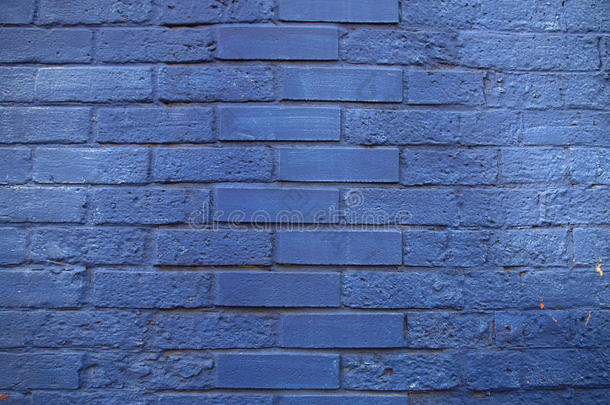 蓝色描画的砖背景墙质地老的粗糙的颜料