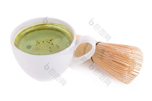 日本抹茶粉采用白色的陶器的勺和绿色的茶<strong>水日</strong>本抹茶拿铁咖啡