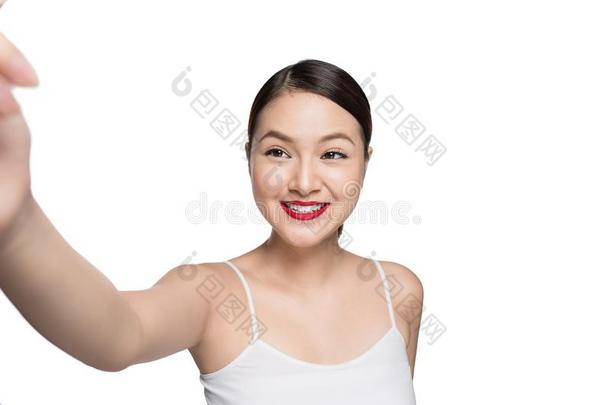 美丽的亚洲人女人和制动火箭化妆迷人的自拍照照片弧点元